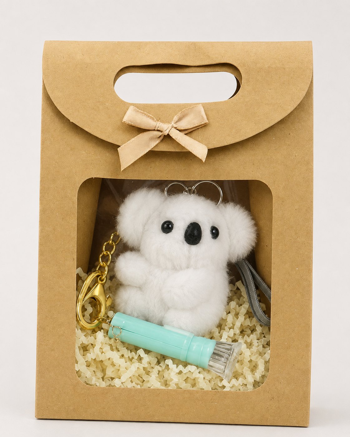 HaloZen snow-white koala safety keychain in a kraft gift box